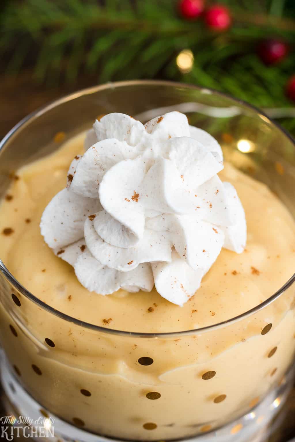 Close up of whipped cream on top of Eggnog Pudding