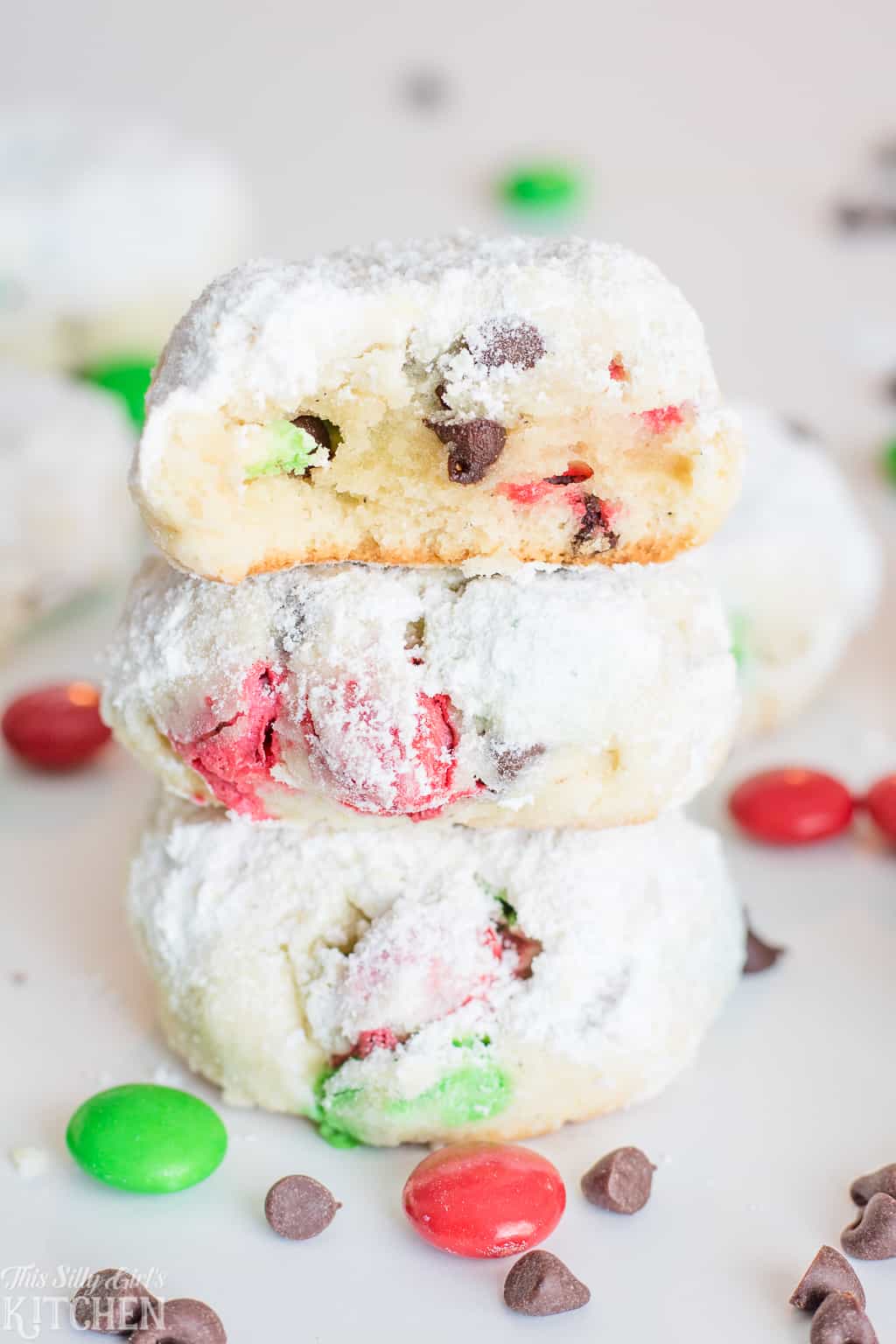 Stacked snowball cookies with mini chocolate chips and M&M's
