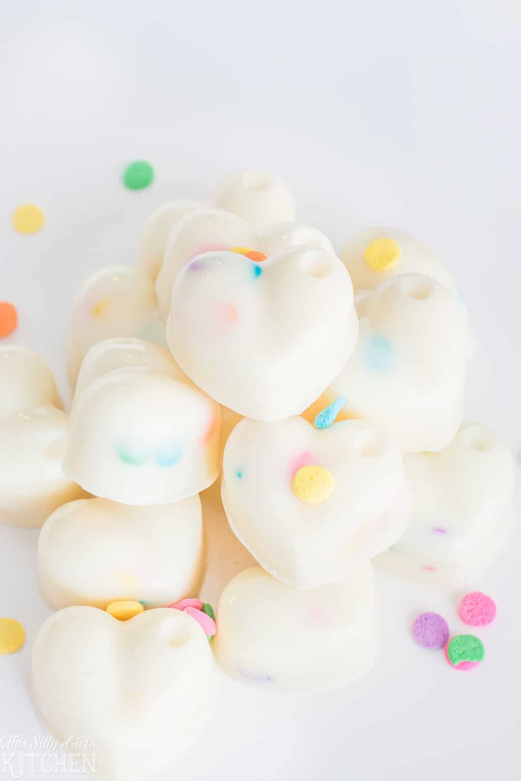 #Funfetti truffles, made with white chocolate #ganache, these are an easy, fun candy you can make at home! #Recipe from ThisSillyGirlsKitchen.com #whitechocolate #truffles #valentinesday #candy