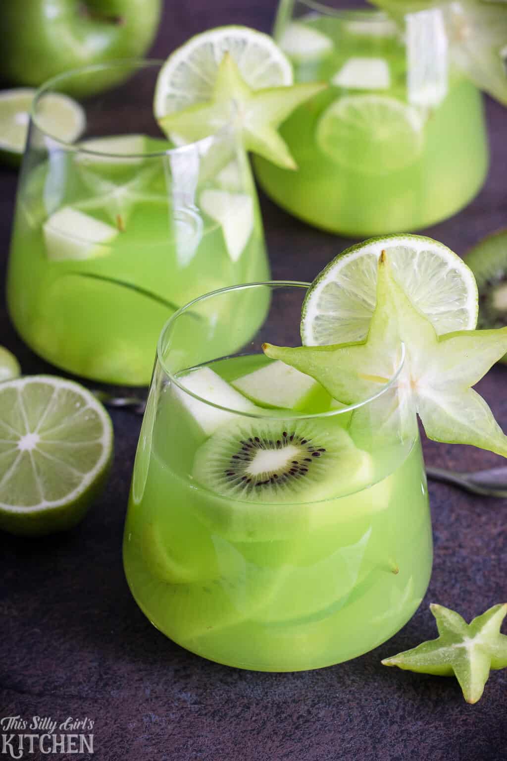 Green Party Punch, an easy and refreshing punch to serve at any party! #Recipe from ThisSillyGirlsKitchen.com #partypunch #punch #green #fruitpunch