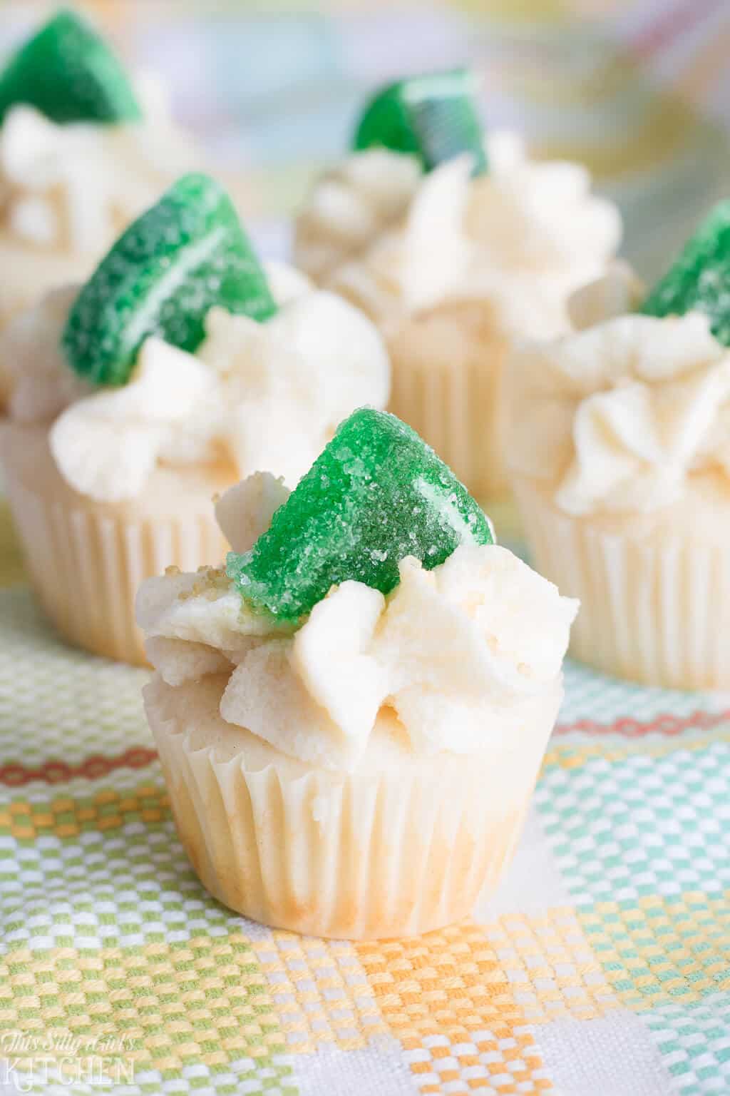 Mini Margarita Cupcakes, festive bite-sized cupcakes with margarita flavors! #Recipe from ThisSillyGirlsKitchen.com #cupcakes #margarita #margaritacupcakes