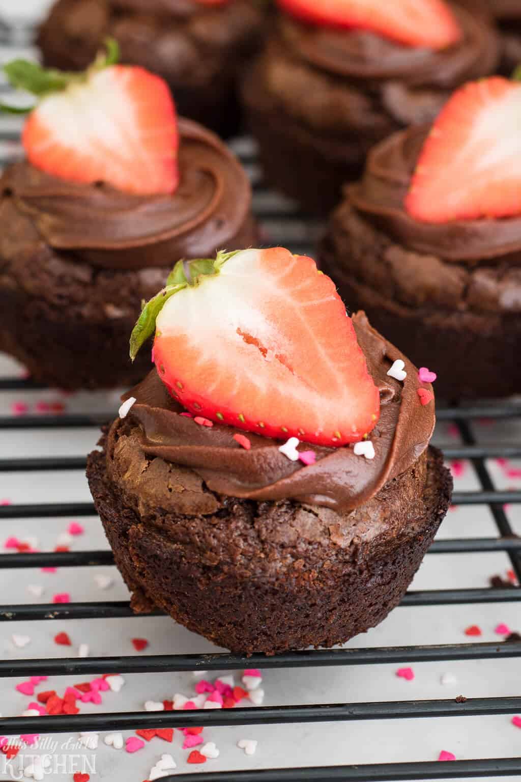 Strawberry Brownie Cups, an easy yet delicious treat for your Valentine! #Recipe from ThisSillyGirlsKitchen.com #brownie #strawberry #chocolate