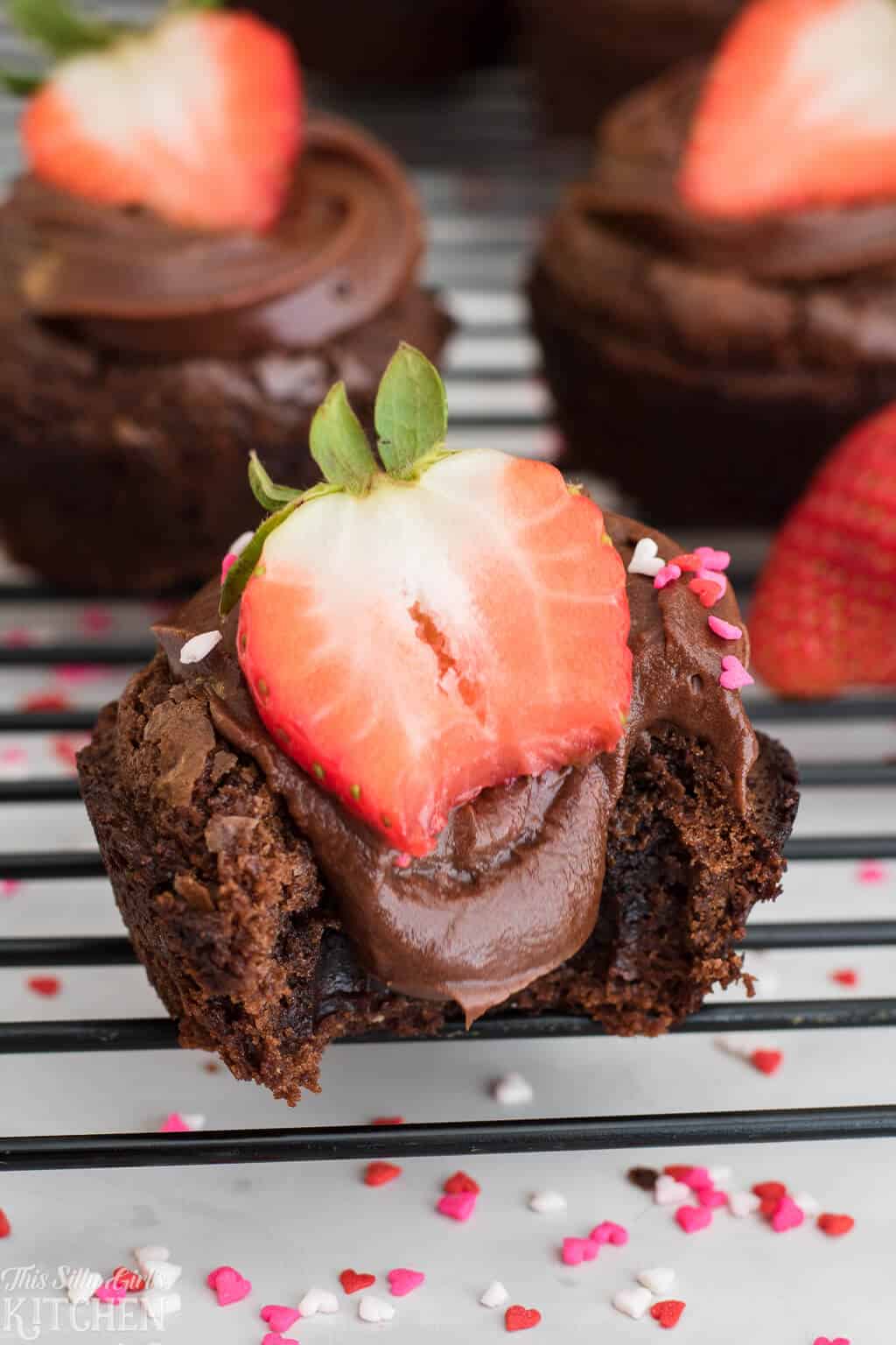 Strawberry Brownies, an easy yet delicious treat for your Valentine! #Recipe from ThisSillyGirlsKitchen.com #brownie #strawberry #chocolate