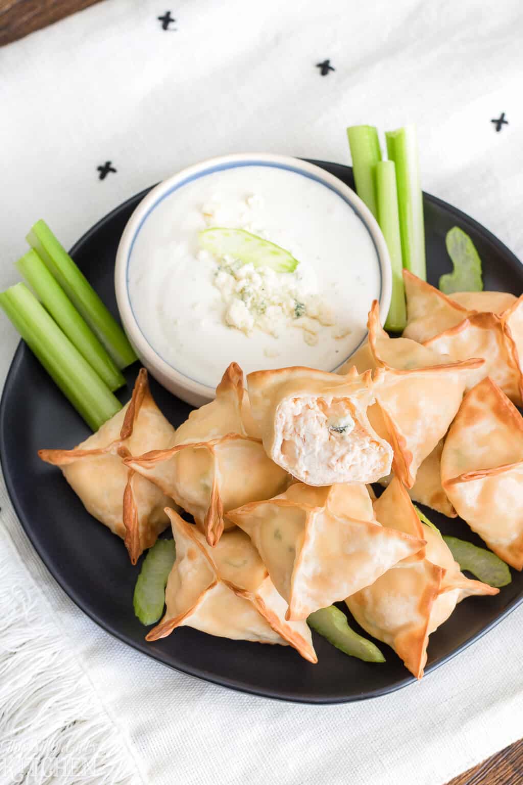 The Best Buffalo Chicken Wontons, only 6 ingredients and ready in 15 minutes, perfect for game day! #Recipe from ThisSillyGirlsKitchen.com #buffalochicken #wontons #airfryer