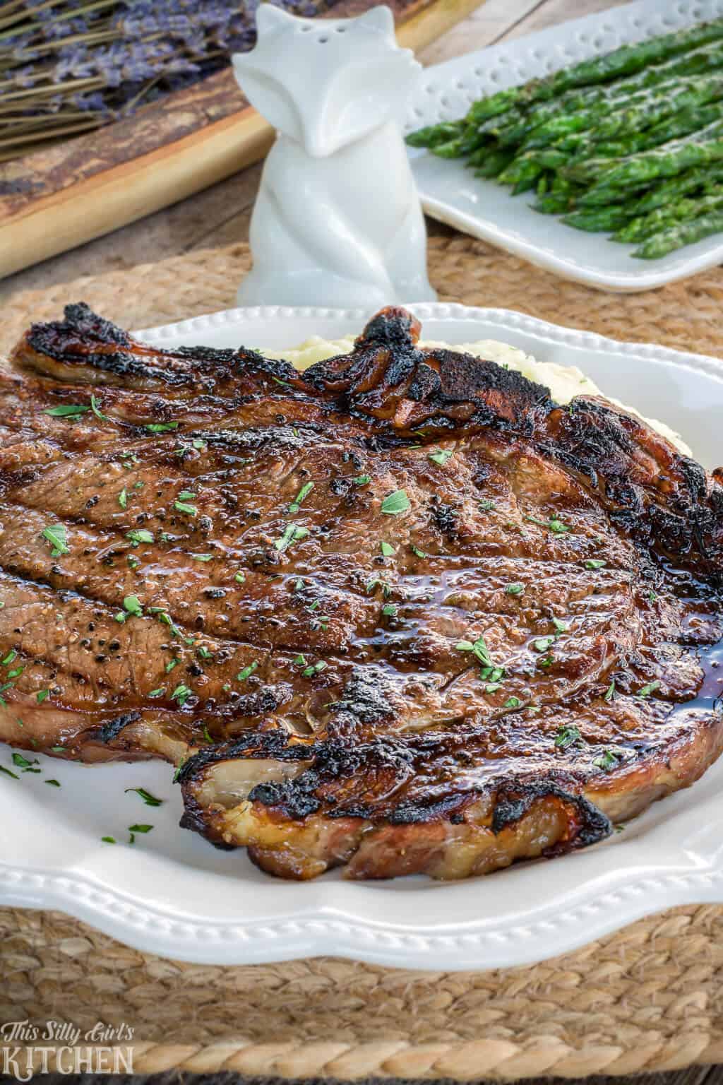 Best Steak Marinade for Grilled Rib Eye Steaks, grilled to perfection, you will make this recipe again and again! #Recipe from ThisSillyGirlsKitchen.com #ribeyesteak #steakmarinade #grilling #beststeakmarinade