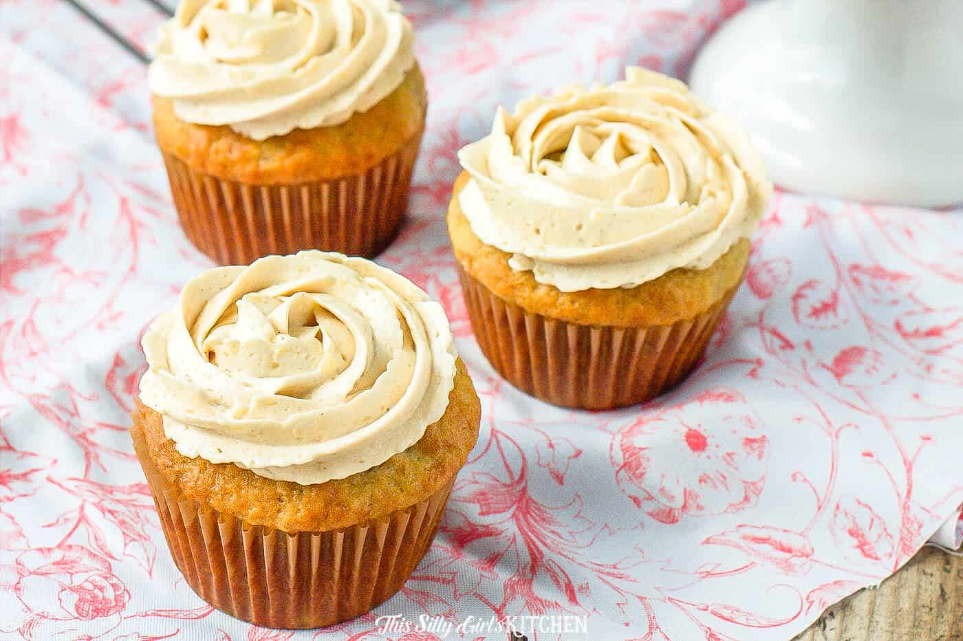 Banana Cupcakes, light, moist cupcakes topped with THE BEST brown sugar frosting. #recipe from thissillygirlskitchen.com #bananacupcakes #brownsugarfrosting #cupcakefrosting #cupcakes