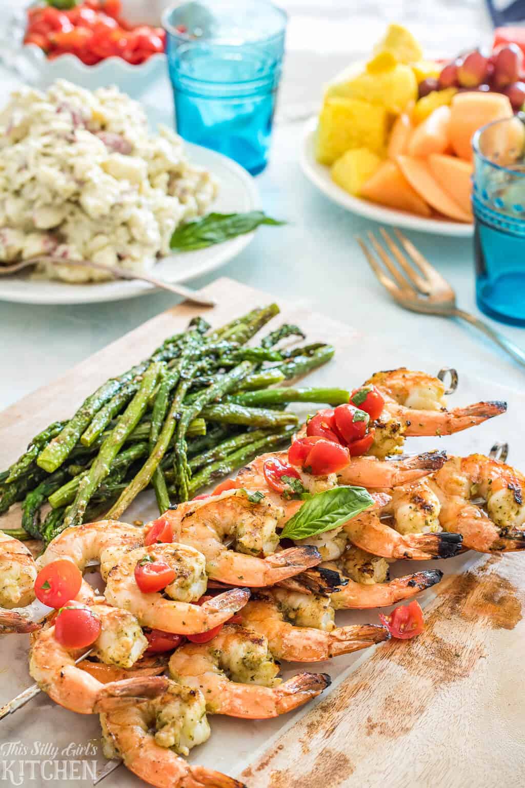 Bruschetta Grilled Shrimp on wooden board with asparagus