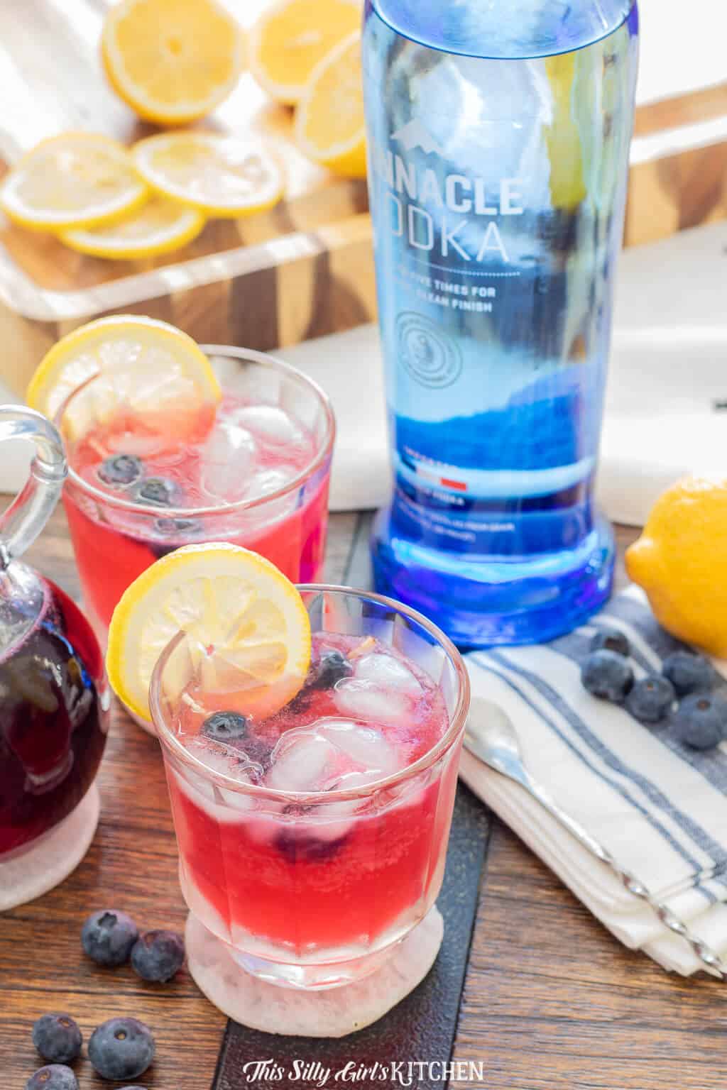Blueberry Lemonade Cocktail, a light and refreshing vodka cocktail, a beautiful signature drink for parties! #recipe from thissillygirlskitchen.com #blueberry #lemonade #blueberrylemonade #cocktail #vodka #vodkacoctail #party #blueberrylemonadecocktail