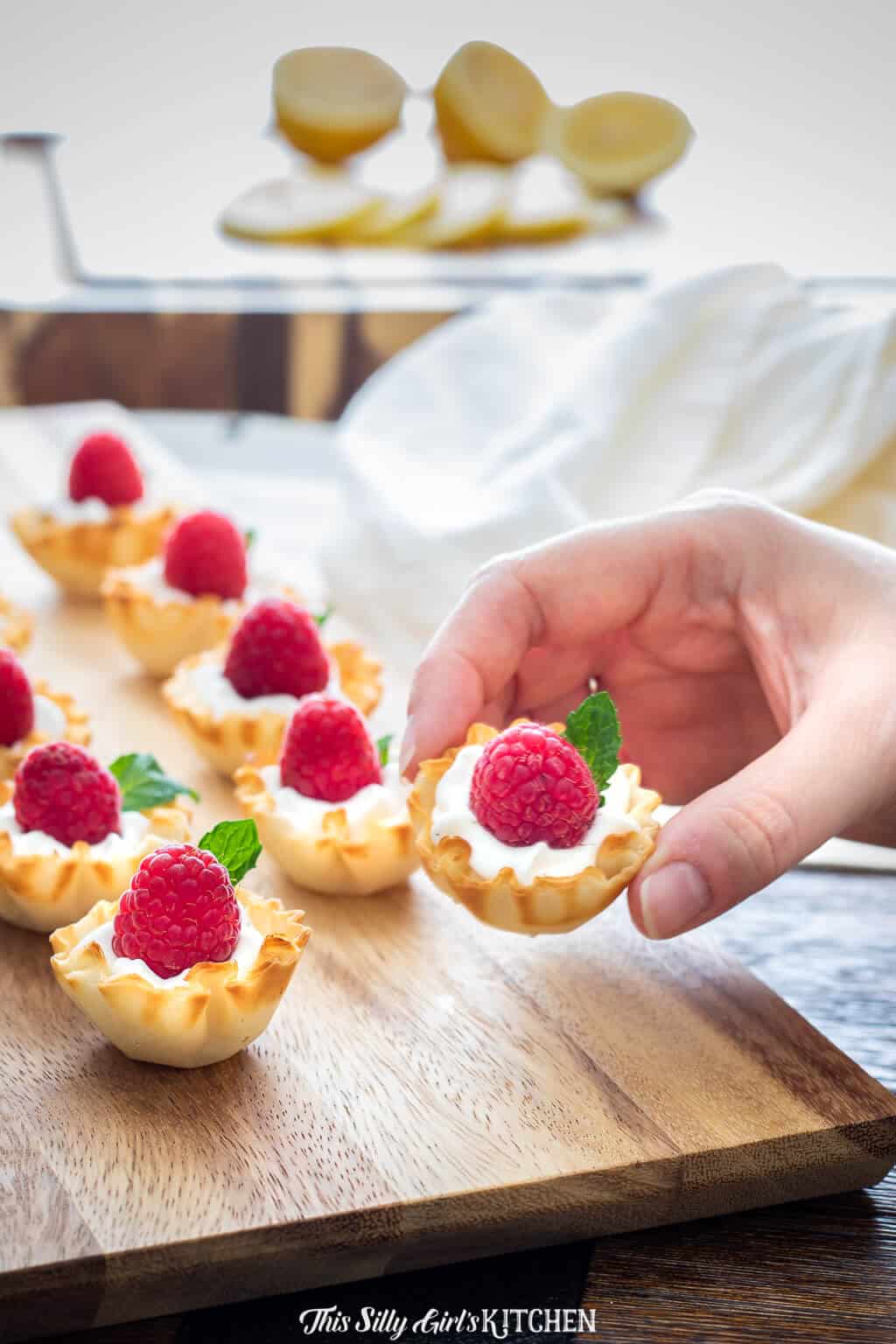 Raspberry Dessert Cups, a simple and easy make-ahead dessert perfect for entertaining! #recipe from thissillygirlskitchen.com #raspberry #dessert #raspberrydessert #whippedcream #lemon #raspberrylemon #raspberrydessertcups