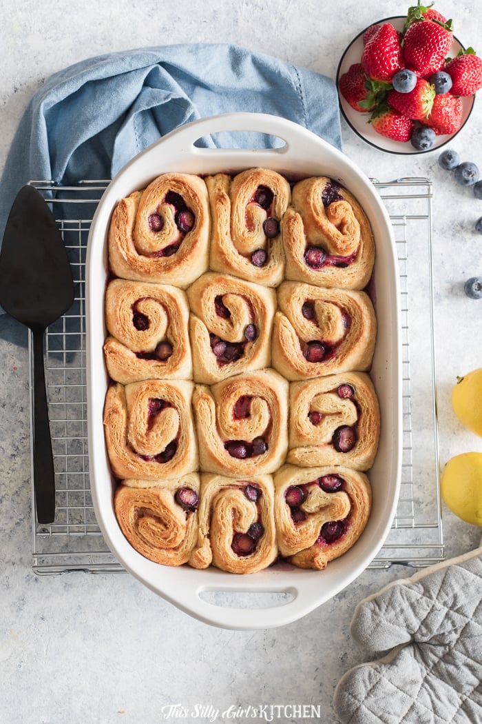 Overhead of unglazed sweet rolls in baking pan