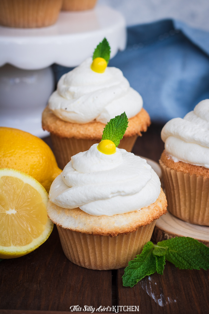 Angel Food Lemon Cupcakes topped with yellow pearl and mint