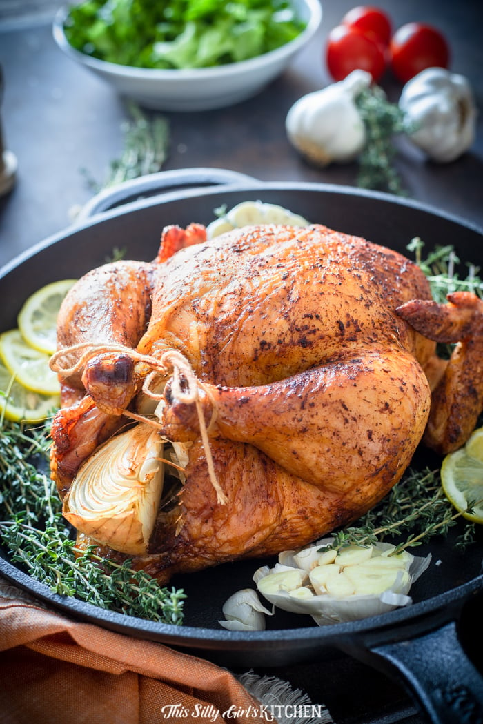 Smoked chicken seems intimidating, I get it, but one of my favorite ways to cook chicken is to smoke it. #recipe from thissillygirlskitchen.com #smokedchicken #wholesmokedchicken #roastedchicken #wholechicken #grilledchicken #chicken