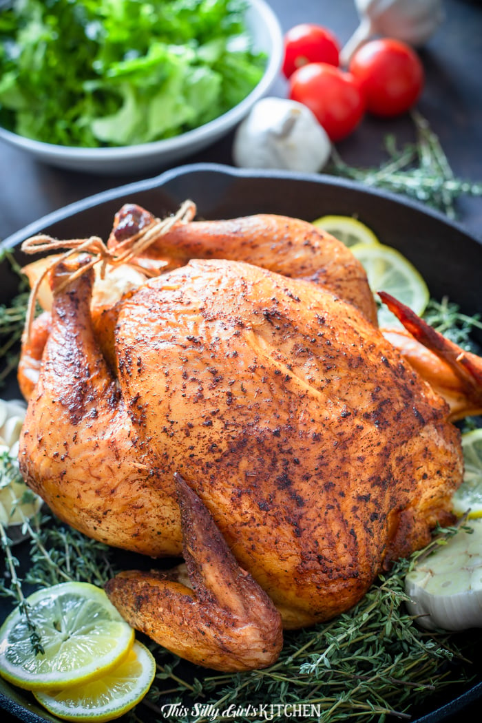 Smoked chicken seems intimidating, I get it, but one of my favorite ways to cook chicken is to smoke it. #recipe from thissillygirlskitchen.com #smokedchicken #wholesmokedchicken #roastedchicken #wholechicken #grilledchicken #chicken