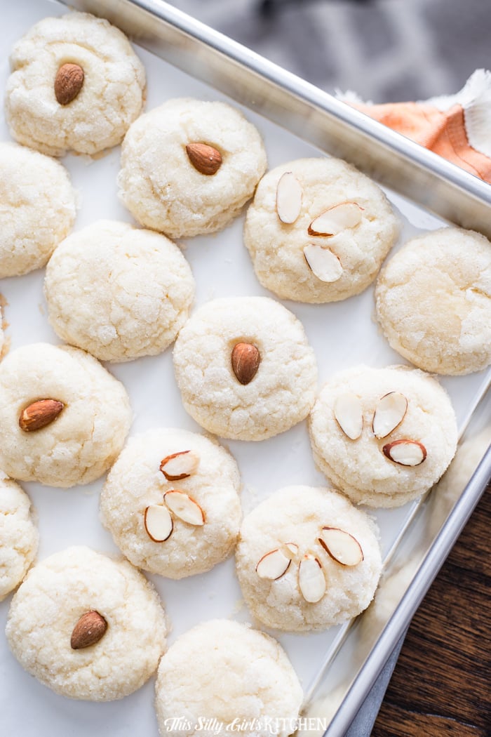 Meltaway Almond Cookies on preachment lined baking sheet