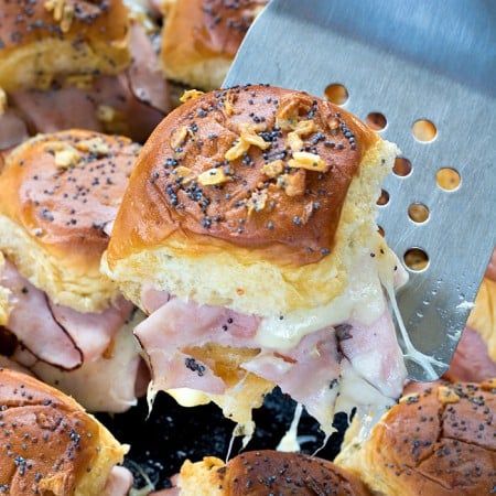 Close up of Ham and Swiss Slider lifted up with spatula square image