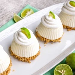 Close up of Mini Key Lime Pies on white platter square image