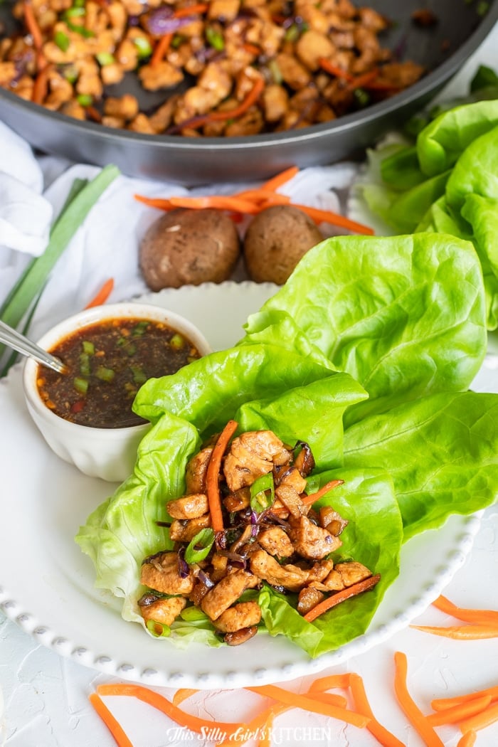 Chicken Lettuce Wraps on plate with dipping sauce