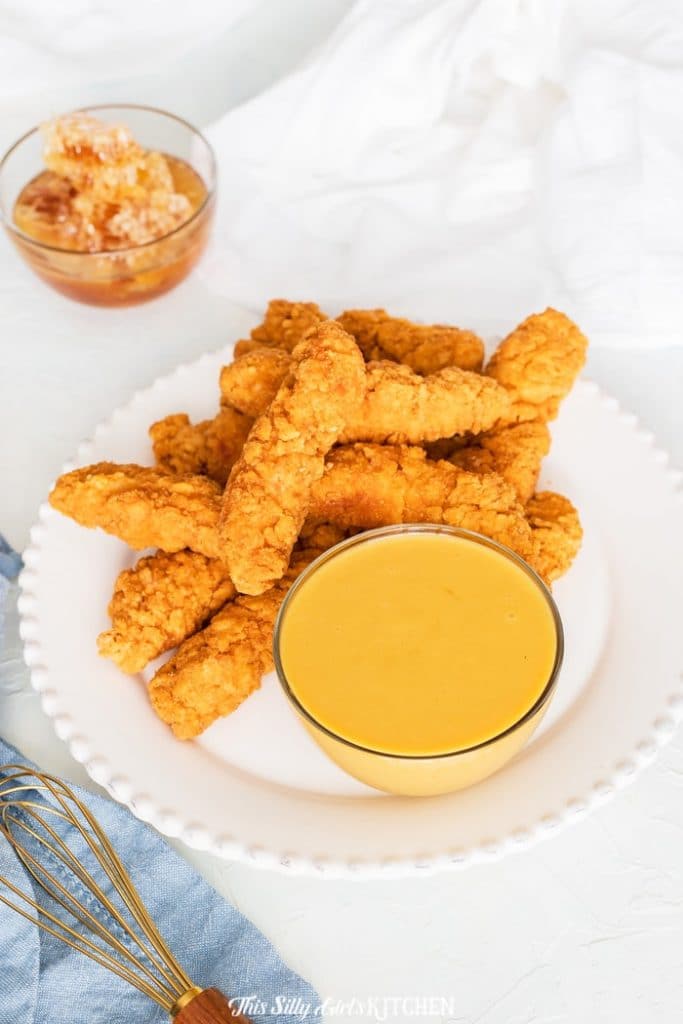 Perfect for dipping, cooking, or dressing a salad, you can't go wrong with a honey mustard recipe in your arsenal. #recipe from thissillygirlskitchen.com #honeymustard #honeymustardrecipe