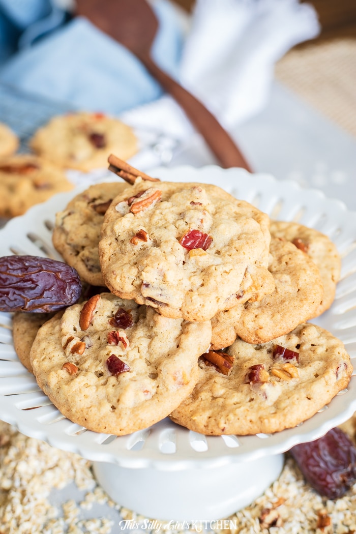 Date Cookies, soft and chewy cookies made with oatmeal, chopped dates, pecans, and a touch of cinnamon. #recipe from thissillygirlskitchen.com #cookies #datecookies #oatmealcookies