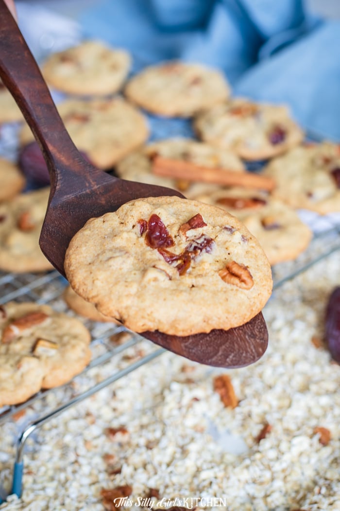 Date Cookies, soft and chewy cookies made with oatmeal, chopped dates, pecans, and a touch of cinnamon. #recipe from thissillygirlskitchen.com #cookies #datecookies #oatmealcookies