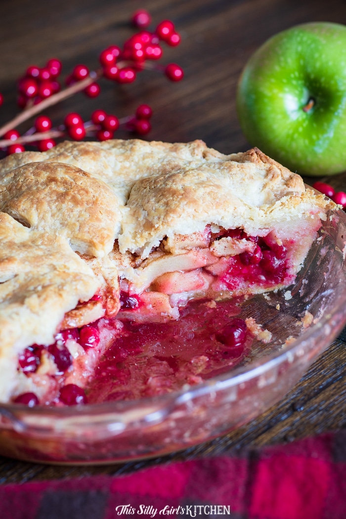 Apple Cranberry Pie, a homemade double pie crust pie stuffed with cinnamon-spiced apples and cranberries.  #recipe from thissillygirlskitchen.com #pie #applepie #cranberrypie #applecranberrypie #cranberryapplepie