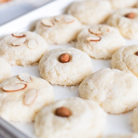 Almond Cookies on baking sheet close up square image