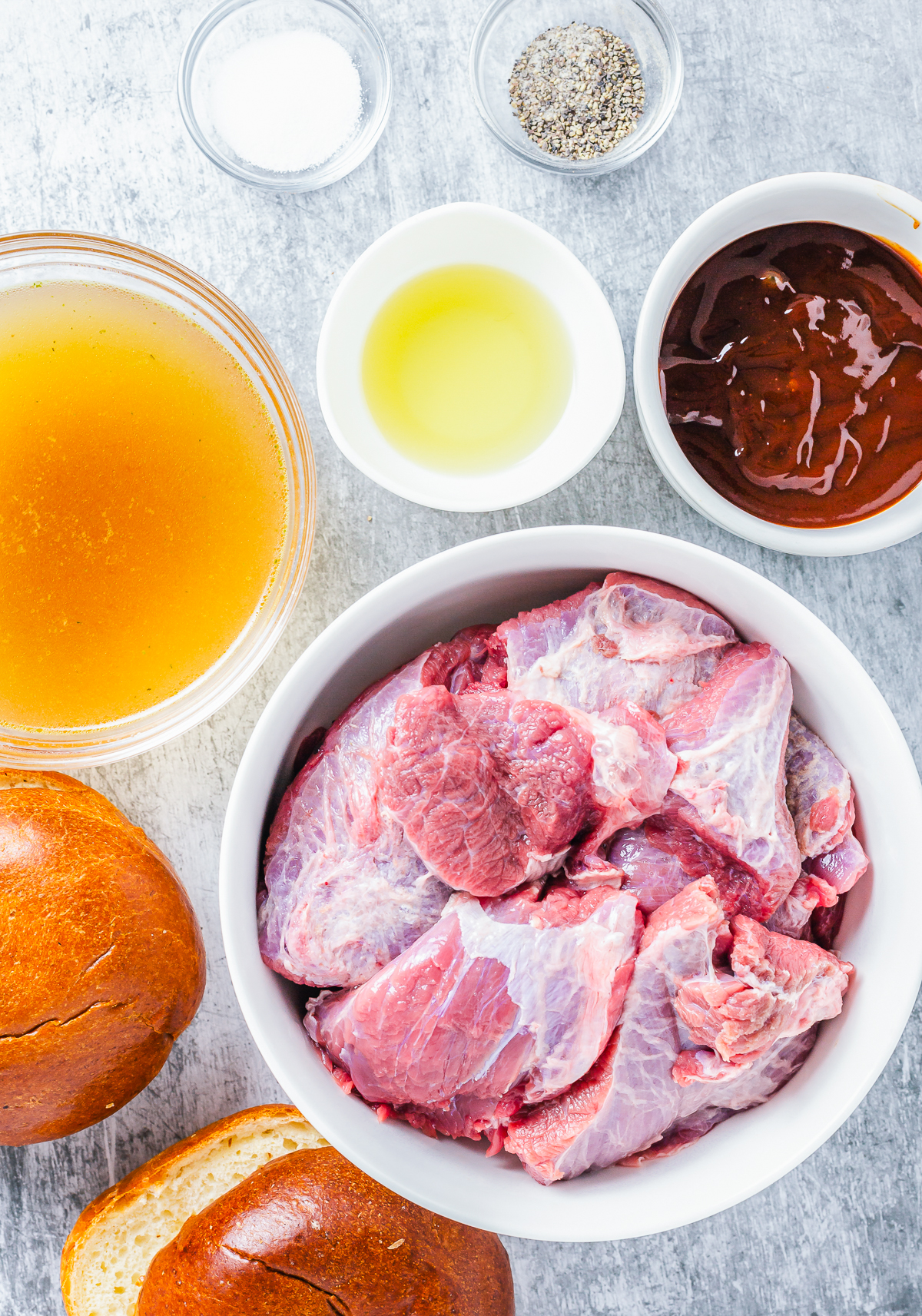 Ingredients needed to make Slow Cooker BBQ Beef Sandwiches.