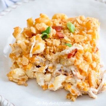 A creamy chicken noodle casserole with bacon, cheddar, and a golden buttery cracker topping.