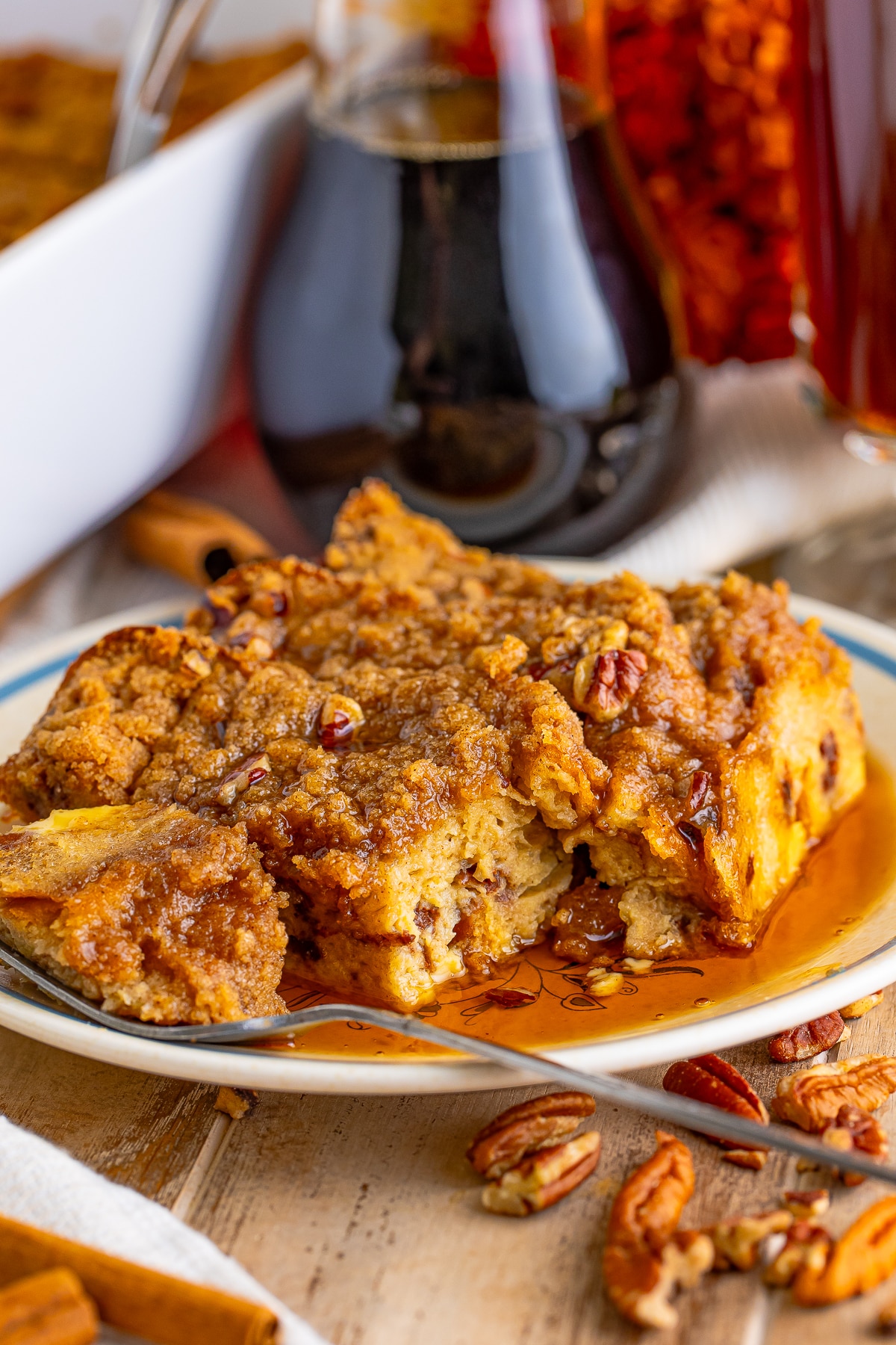 a piece of Toast on a plate with a bite taken out