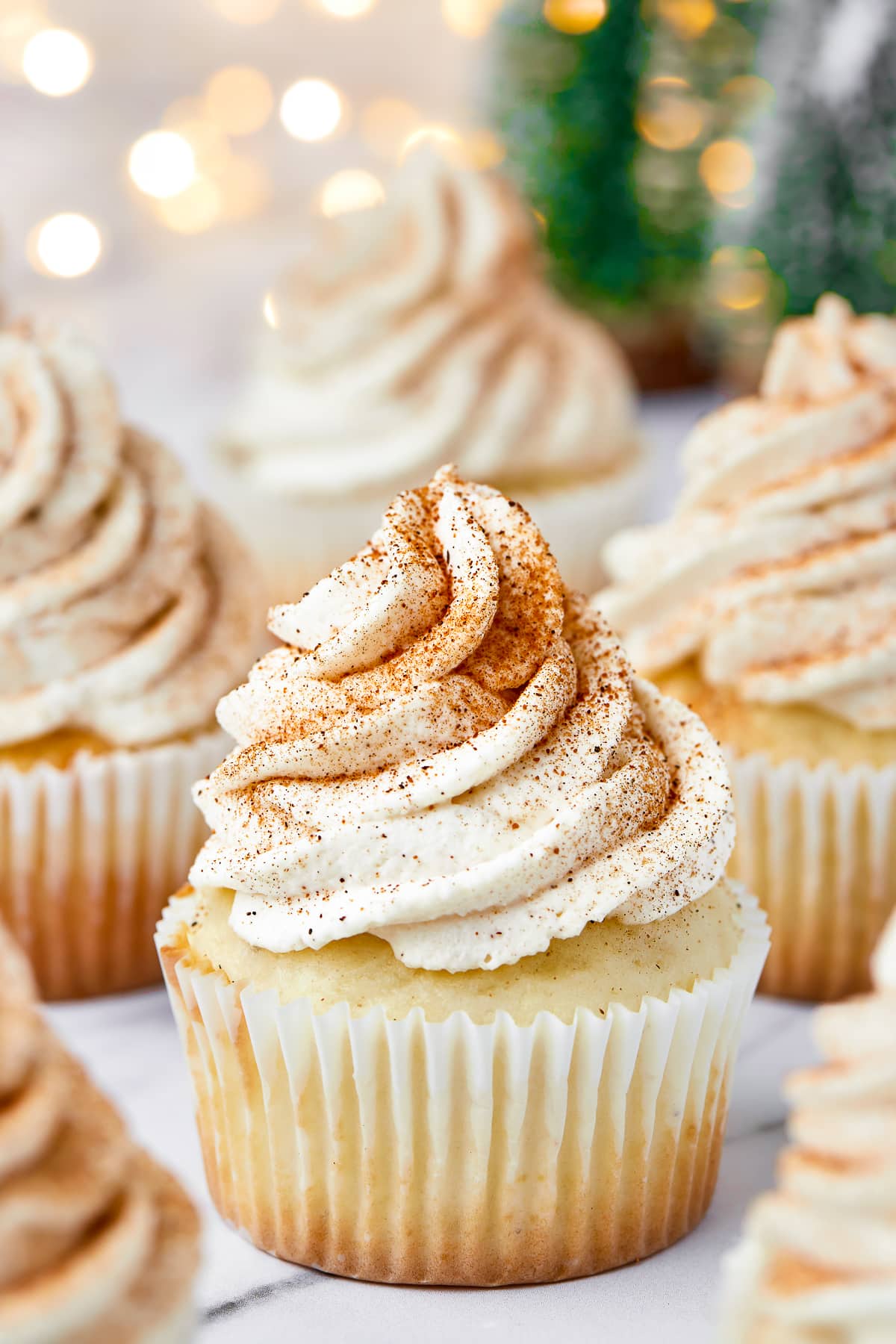 Close up of one of the Eggnog Cupcakes topped with spices.