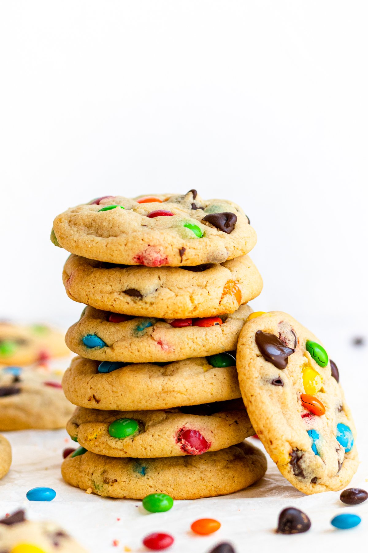 Stacked cookies with one cookie leaning against the side