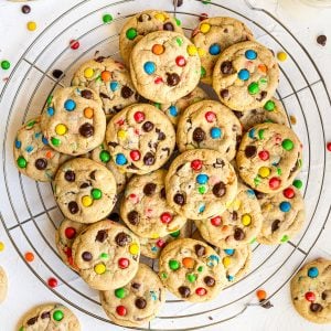 Overhead of finished cookies on round wire rack stacked square image