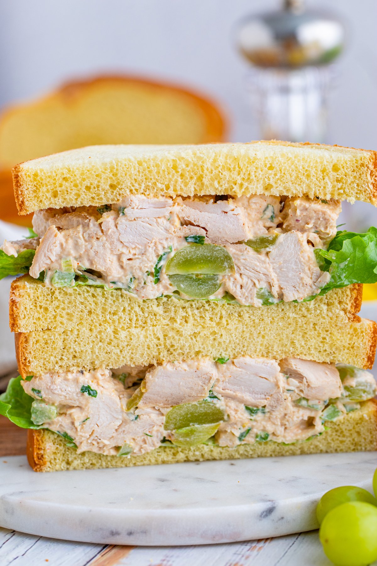 Sliced open Chicken Salad with Grapes sandwich