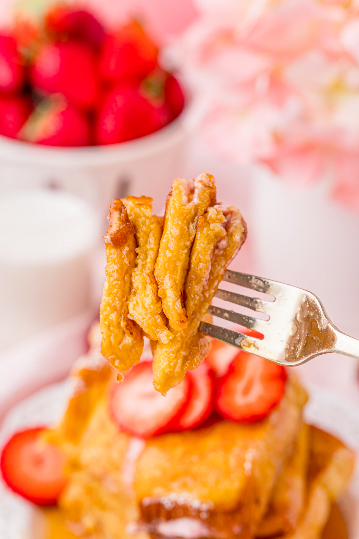 Fork holding up slices of French toast