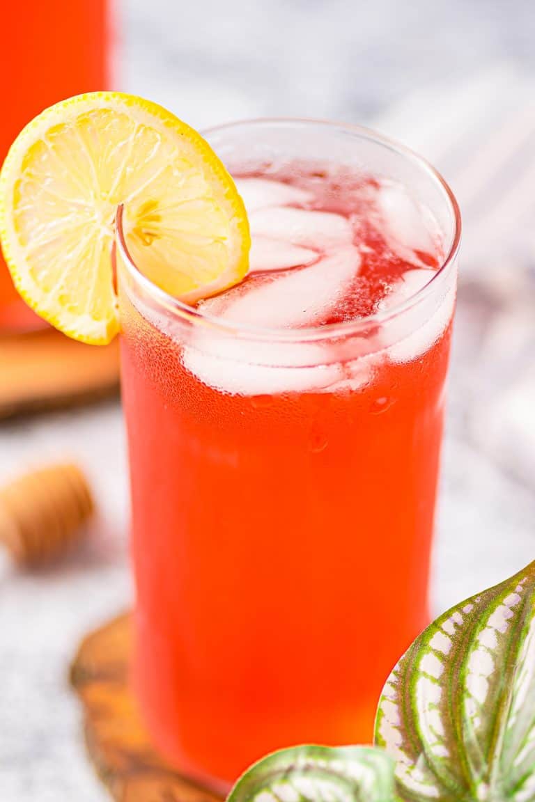 Overhead of Hibiscus Tea Recipe showing ice and lemon garnish