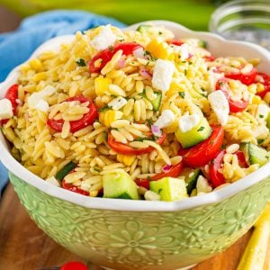 Orzo Pasta Salad in green serving bowl square image