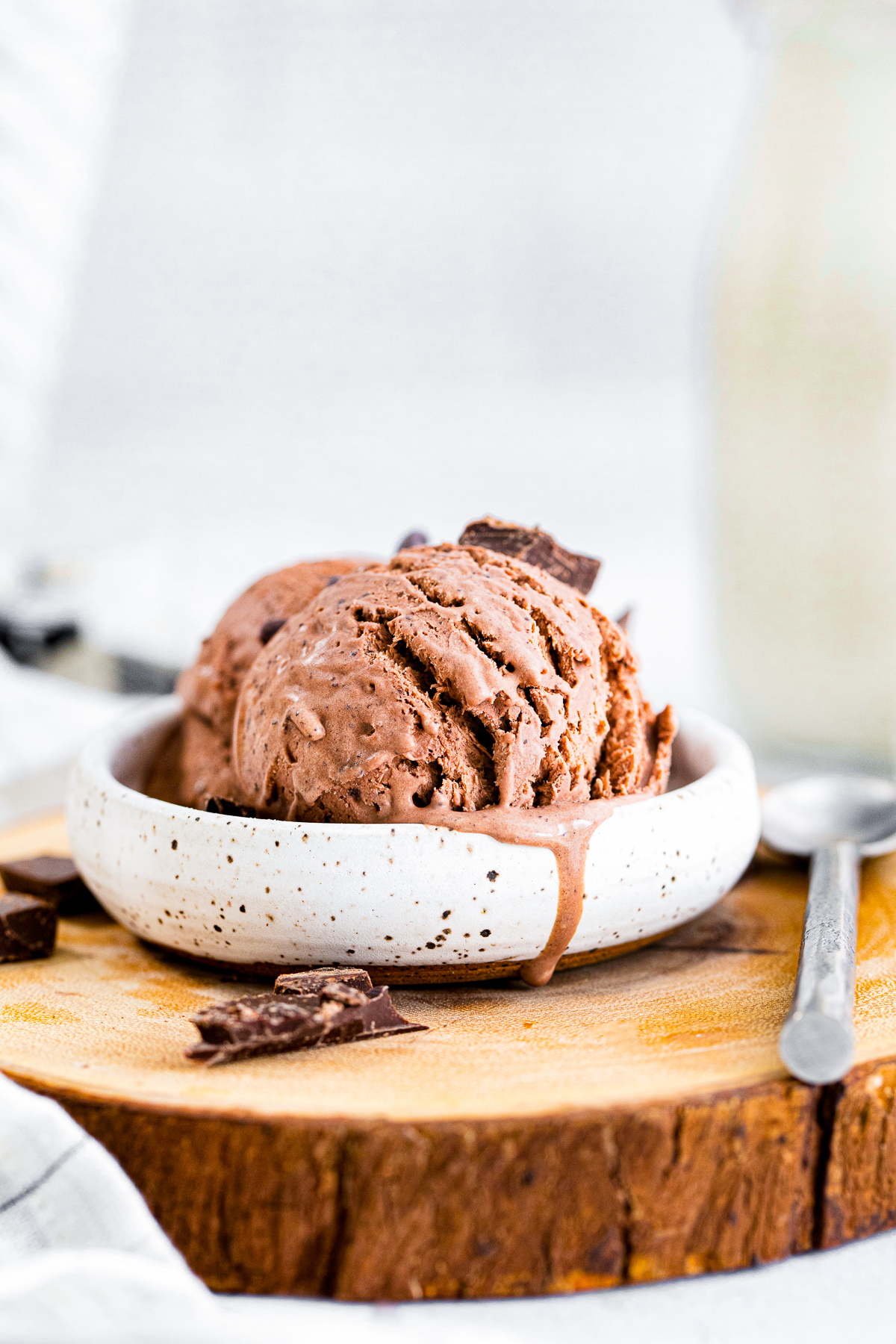 Side view of No Churn Chocolate Ice Cream Recipe in white bowl