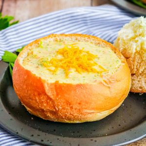 Square image of soup in bread bowl.