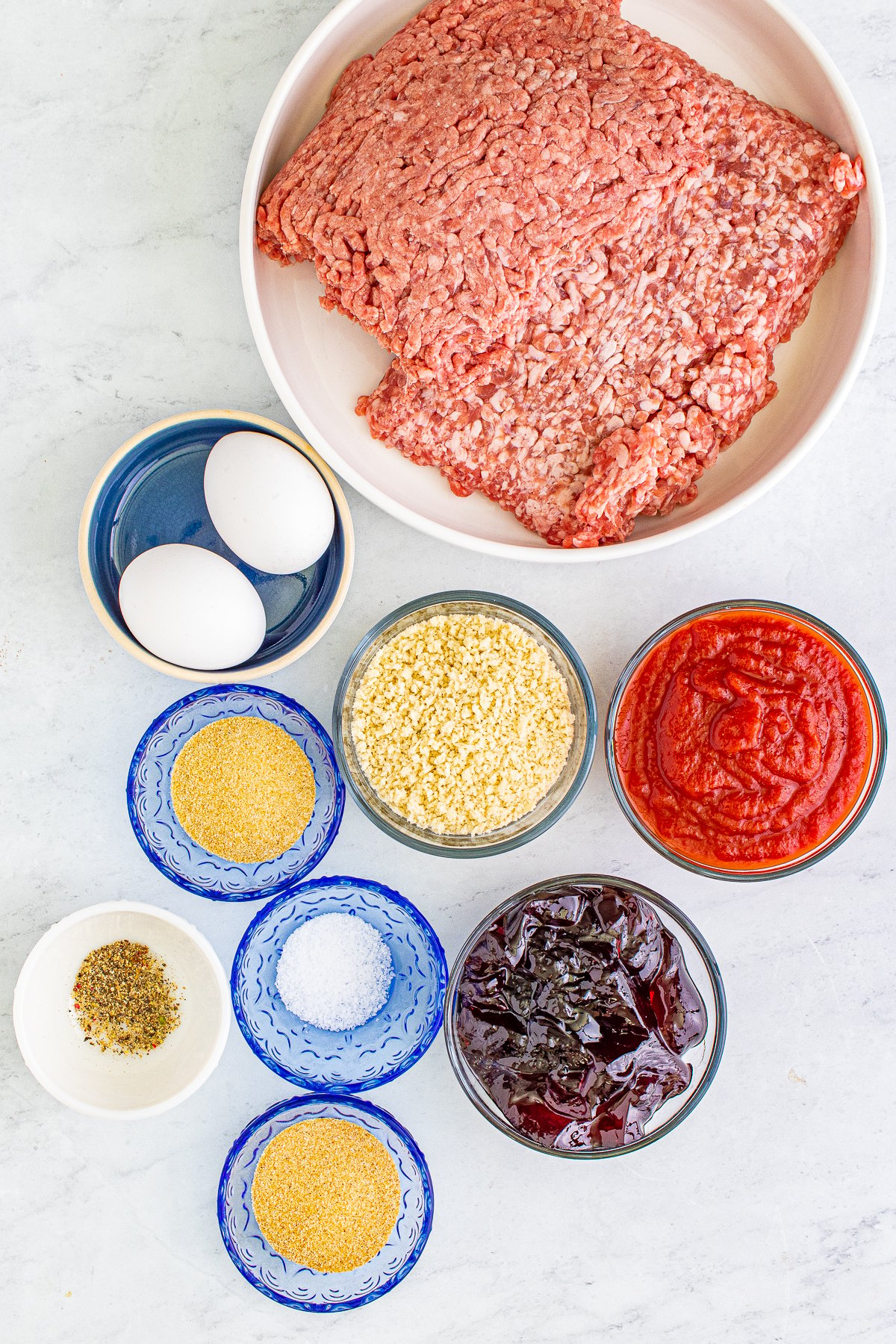 Ingredients needed to make Crock Pot Grape Jelly Meatballs.