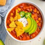 Overhead of the Vegetarian Chili Recipe in bowl with garnishes.