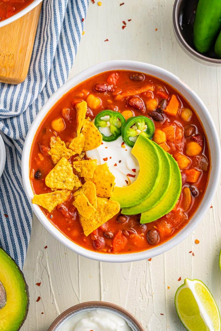 Overhead of the Vegetarian Chili Recipe in bowl with garnishes.
