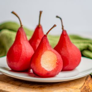 Square image of Poached Pear Recipe on plate.