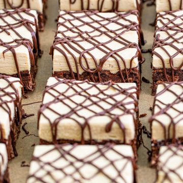 Cut Peanut Butter Brownies on parchment paper.