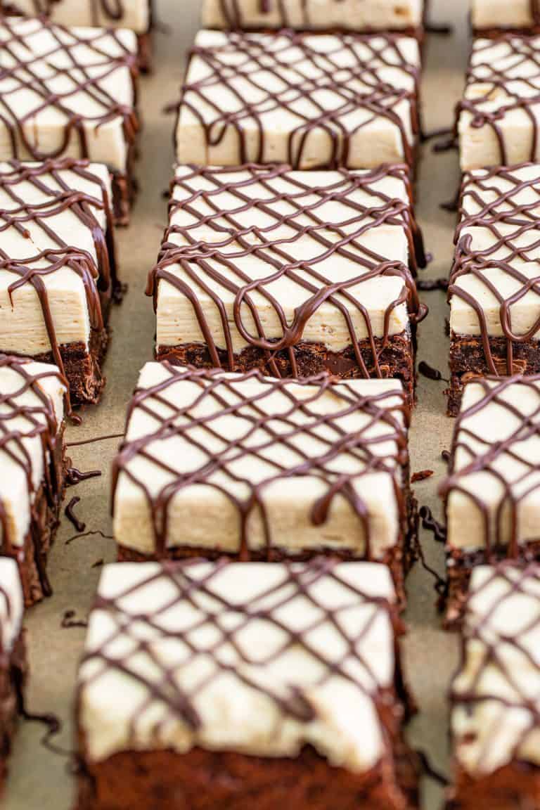 Cut Peanut Butter Brownies on parchment paper.