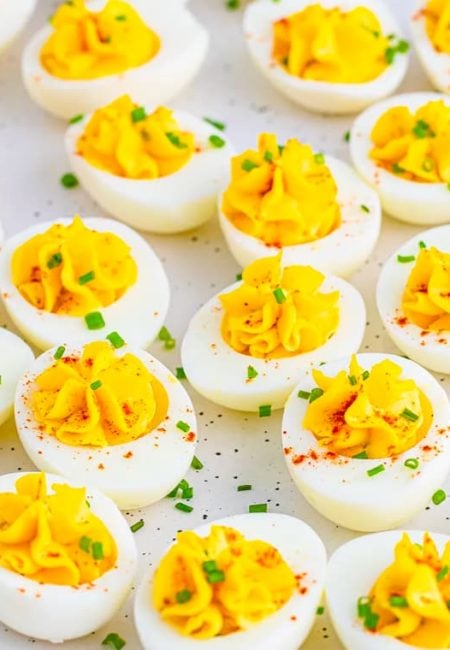Close up of deviled eggs on table.