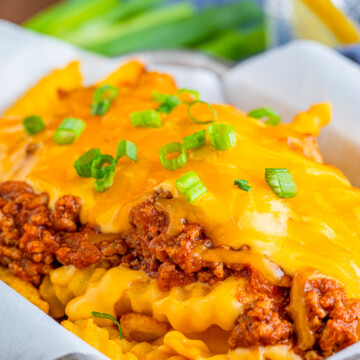 Side view showing layers of Chili Cheese Fries.