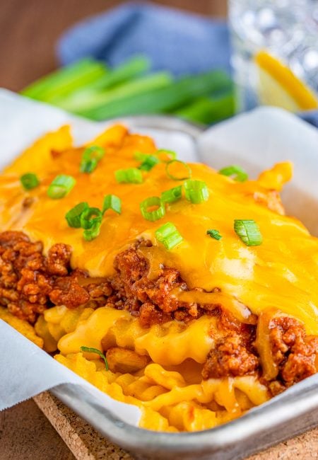 Side view showing layers of Chili Cheese Fries.