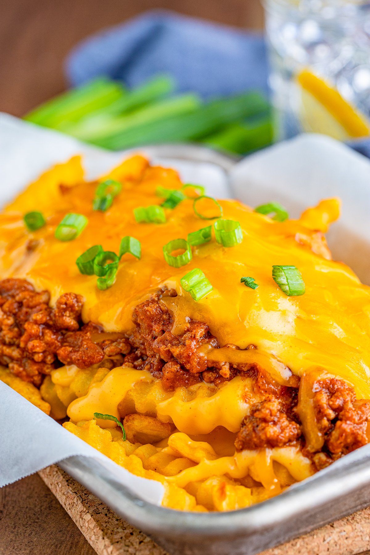 Side view showing layers of Chili Cheese Fries.