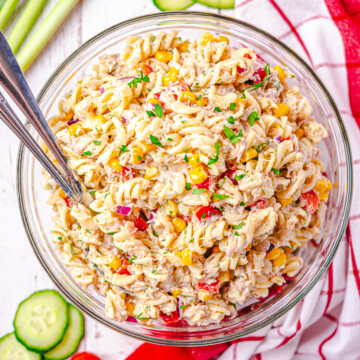 Overhead of Tuna Pasta Salad in bowl with spoons.