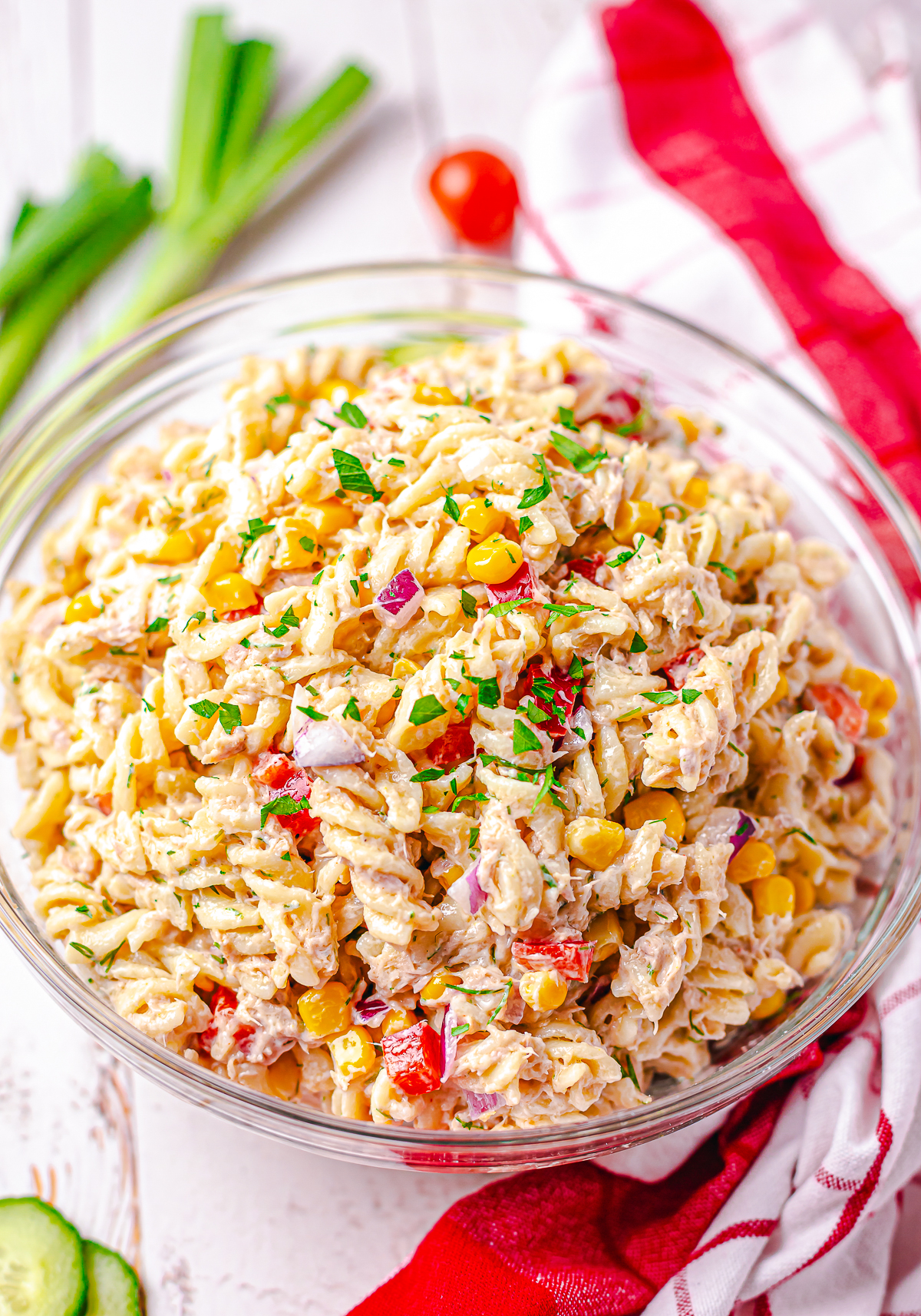 Finished Tuna Pasta Salad in clear bowl.